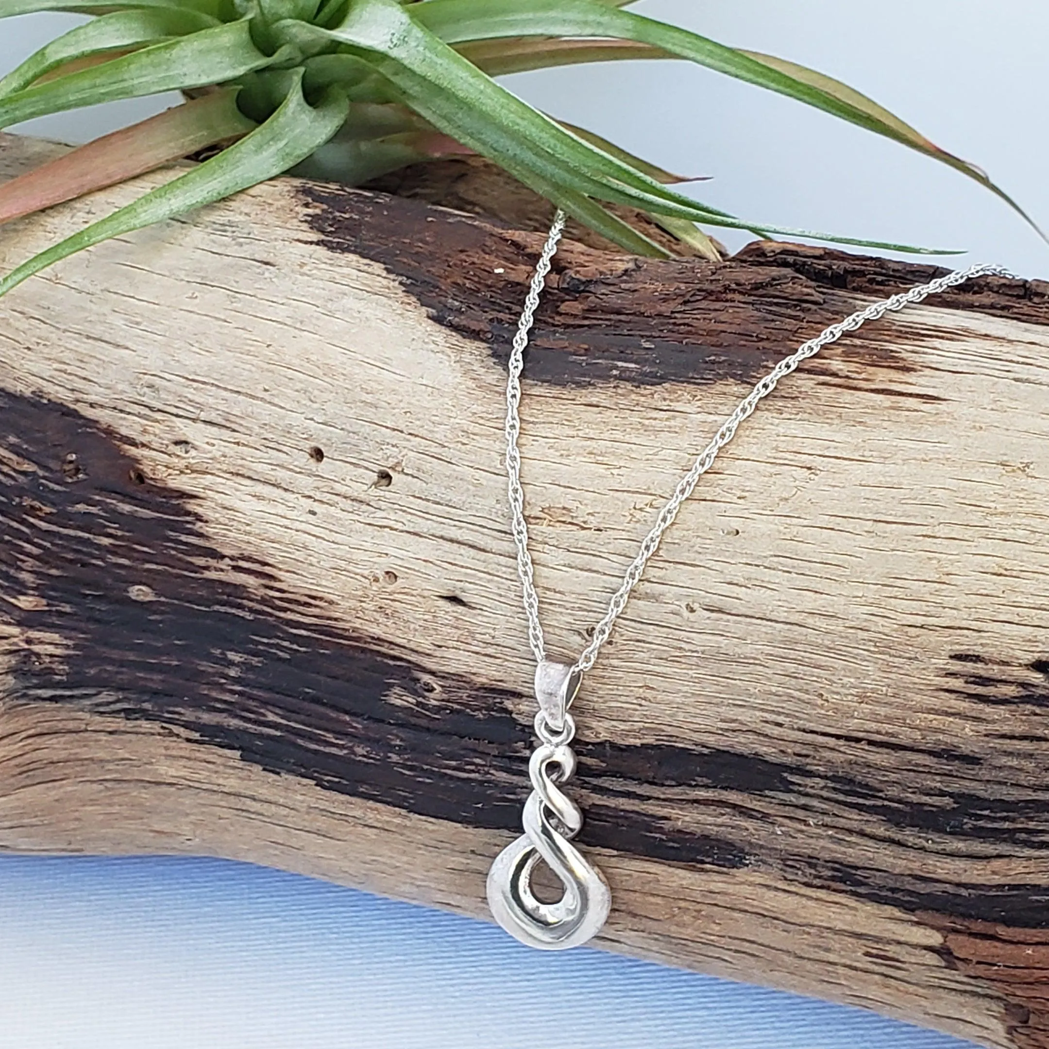 Infinity symbol pendant