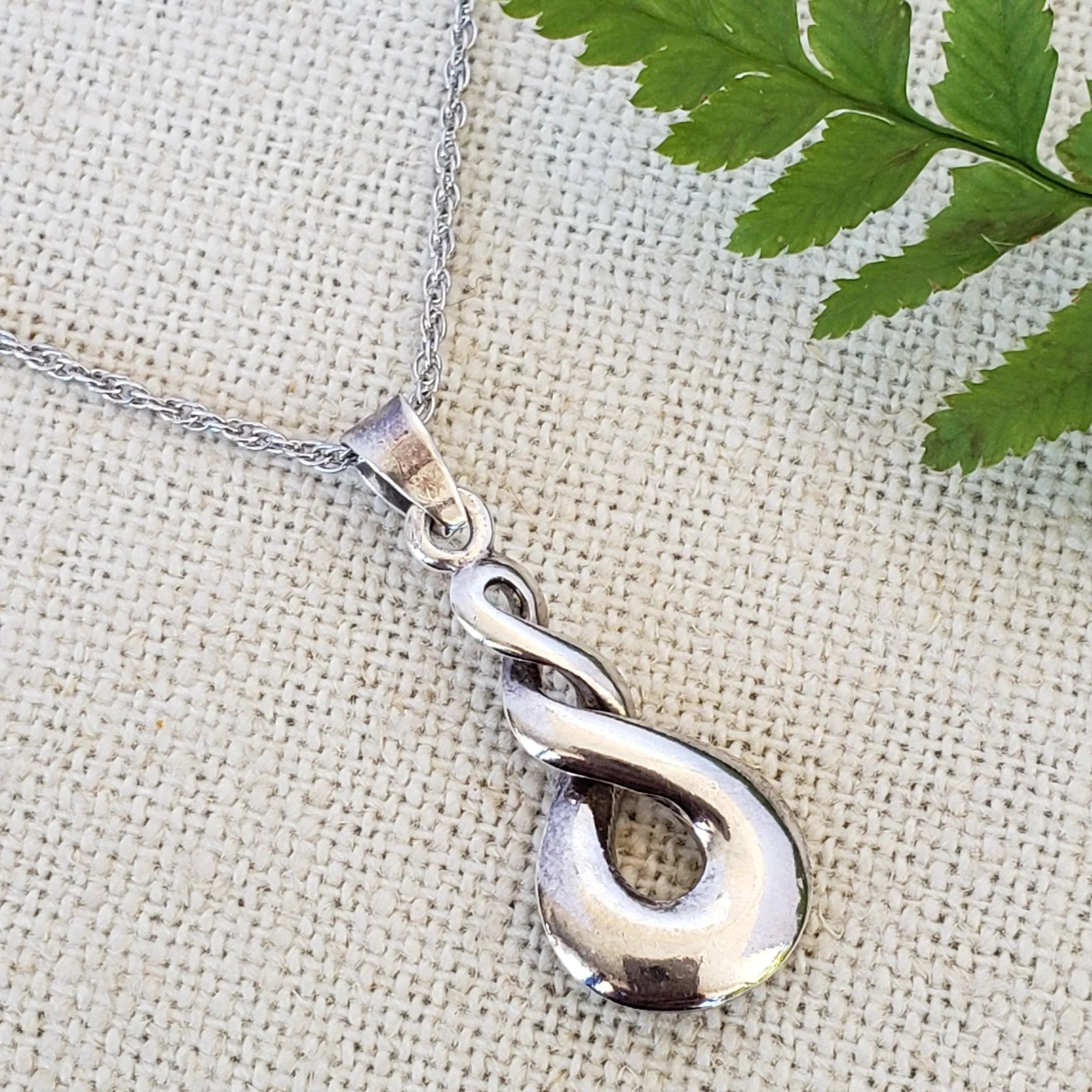 Infinity symbol pendant