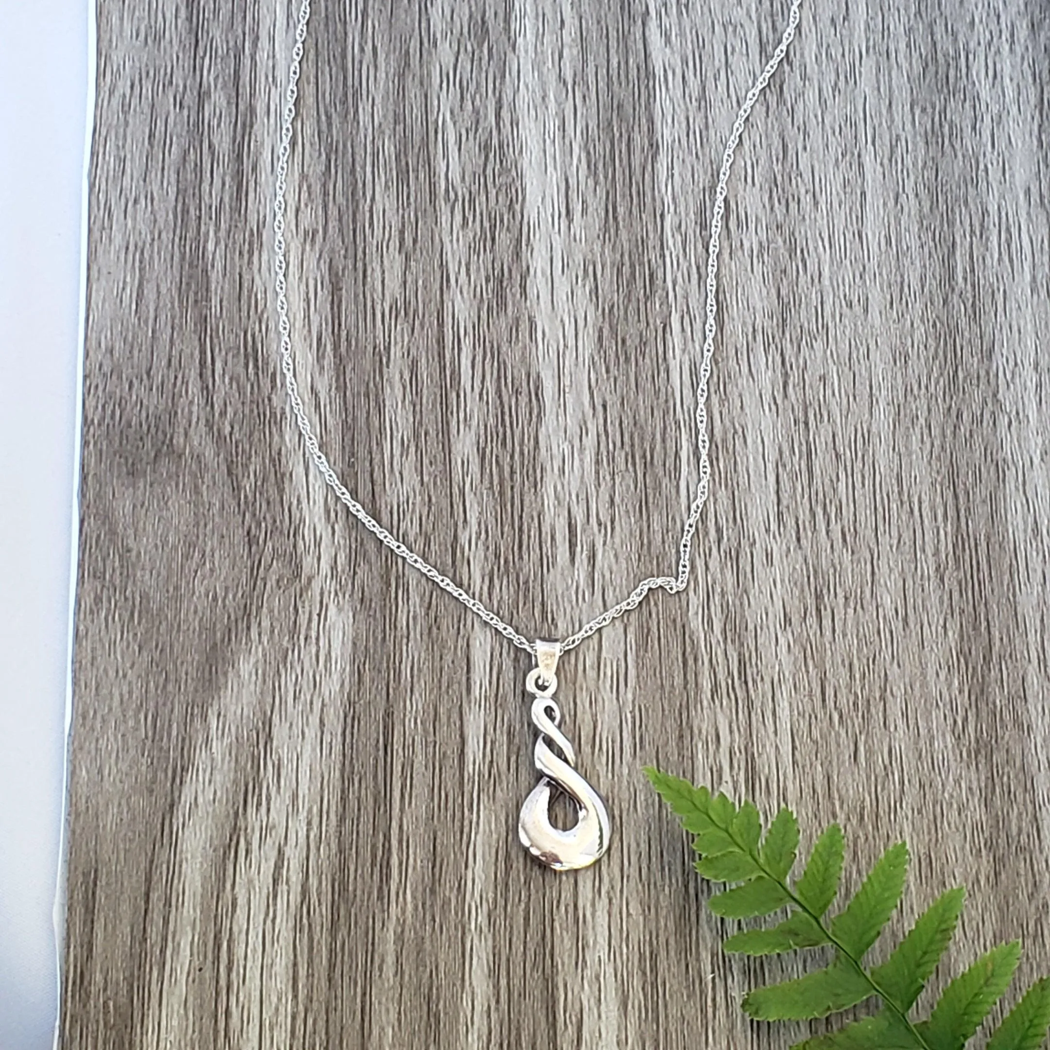 Infinity symbol pendant