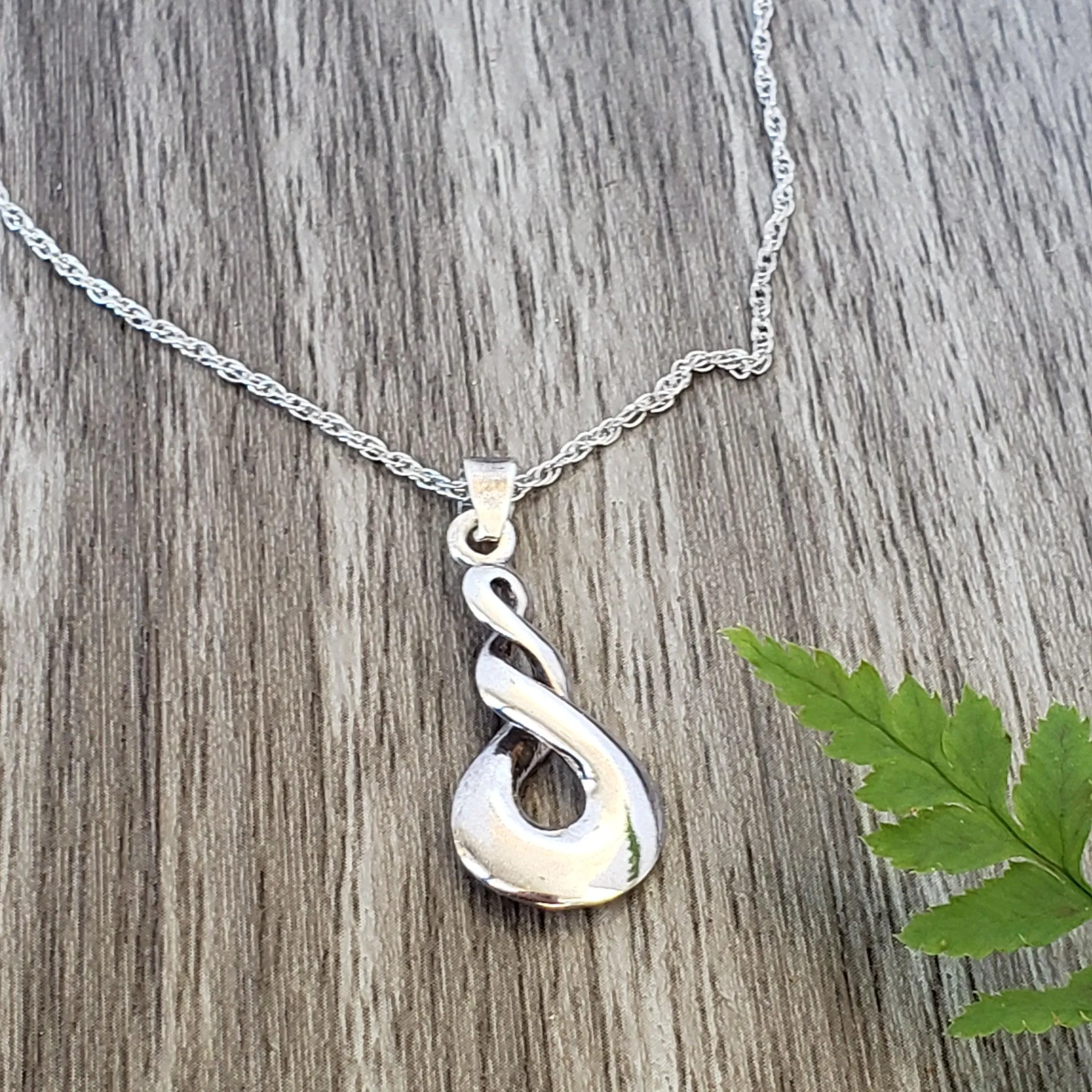 Infinity symbol pendant